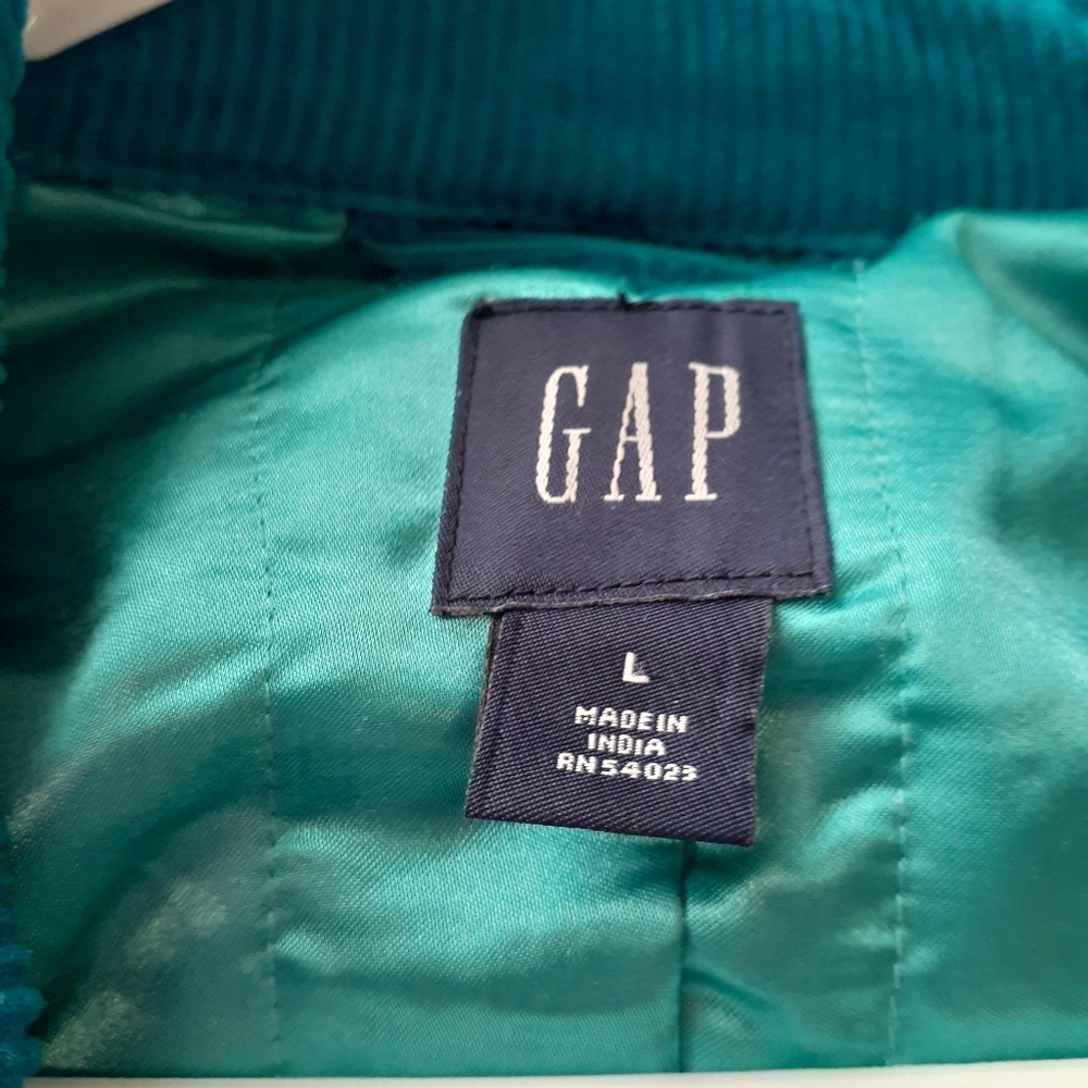 A corduroy turquoise double breasted pea coat